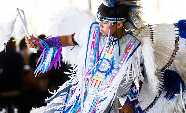 man in native american attire